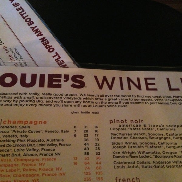 Photo taken at Louie&#39;s Wine Dive by Marcos H. on 9/14/2013