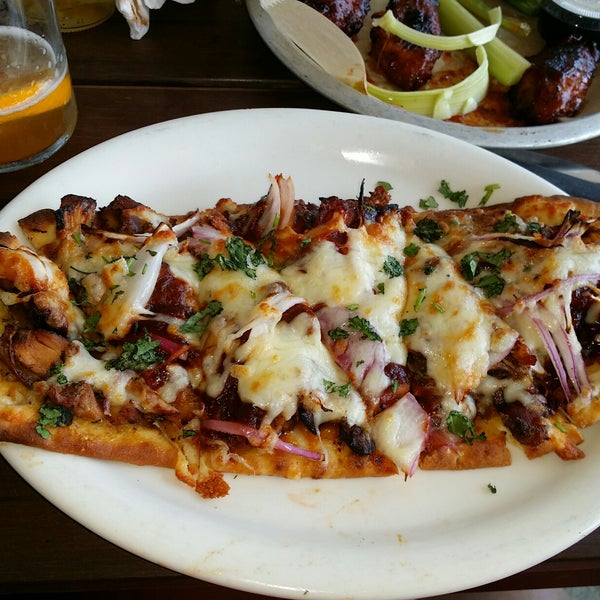 Flatbread pizza was amazing. Wings were good but still had feathers.  Bourbon sauce was excellent.  The bill was a lot lower than we expected it to be. Great place we will definitely be back!