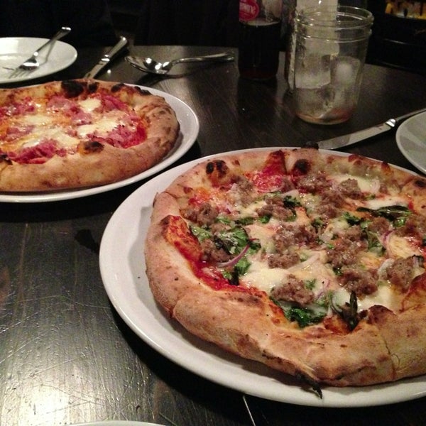 Photo taken at Benchmark Pizzeria by Julianne C. on 1/22/2013