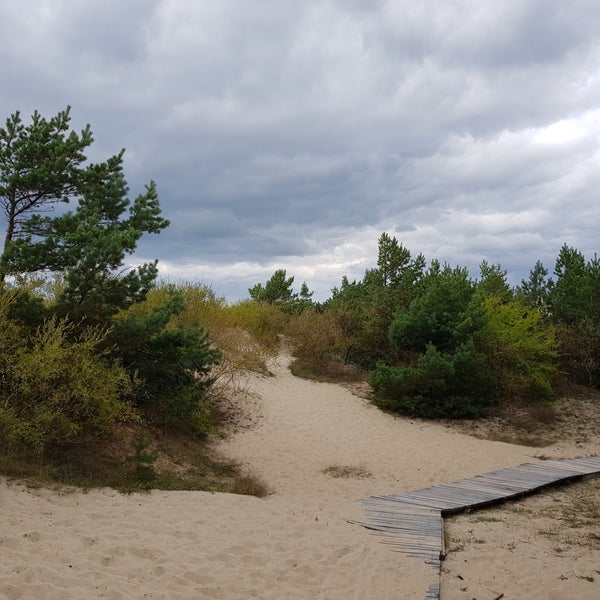 Photo taken at Palanga Beach by Inese V. on 9/10/2019