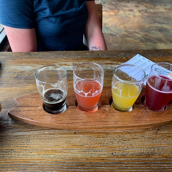 Photo taken at New Smyrna Beach Brewing Company by Ray G. on 3/29/2021