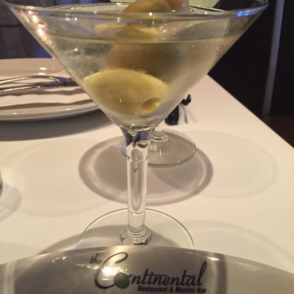 Photo taken at Continental Restaurant &amp; Martini Bar by Gabby D. on 6/5/2015