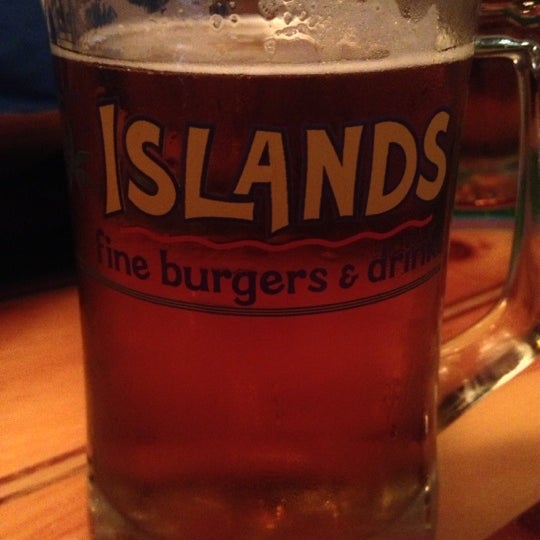 Photo taken at Islands Restaurant Long Beach Towne Center by Ray L. on 12/8/2012
