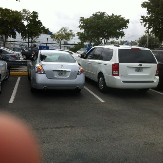 Photo taken at Dollar Rent A Car by Andrea F. on 12/15/2012