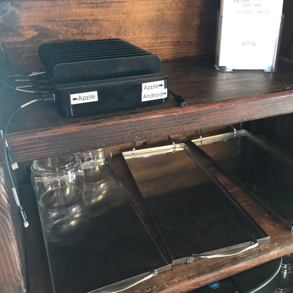 They offer a phone charging station for both Apple and Android right above the water cooler. It’s the perfect place to charge your phone while you sit by the fire and play a board game.