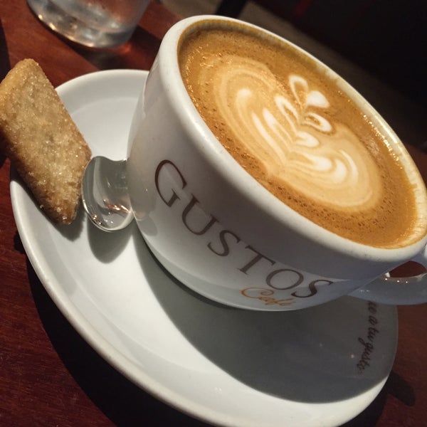 Photo taken at Gustos Coffee Co. by Pierina R. on 12/3/2015