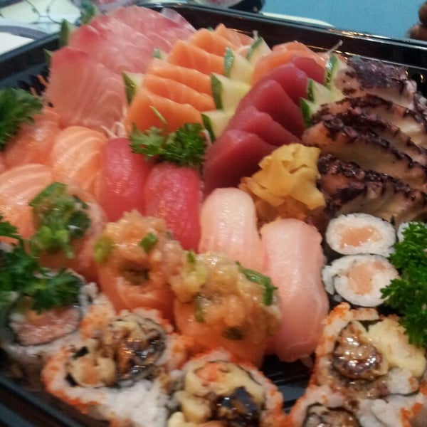 Photo taken at Sushi Mart by Sergio D. on 8/1/2014
