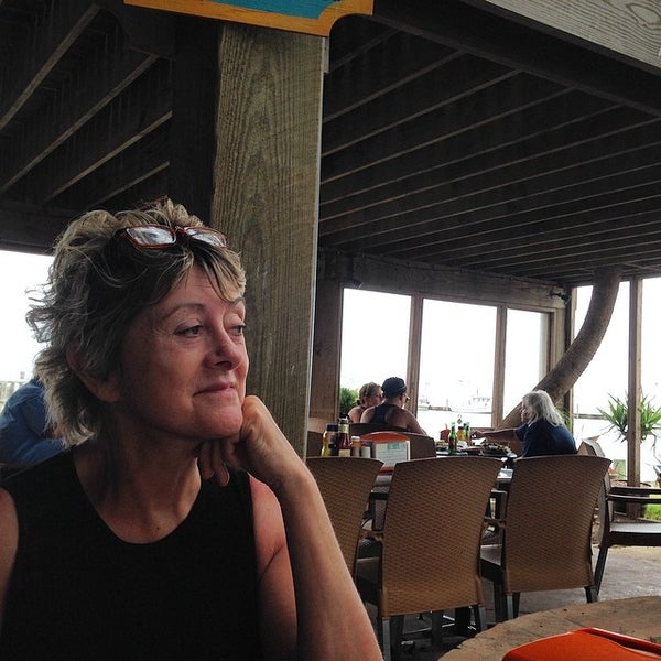 Photo taken at Moondog Seaside Eatery by Jen R. on 5/6/2014