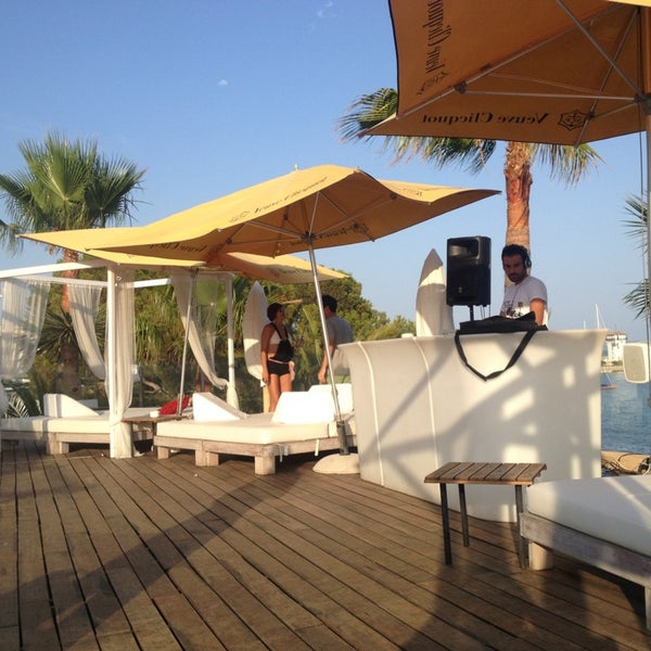 Photo taken at Mood Beach &amp; Restaurant by Alessandro C. on 7/21/2013