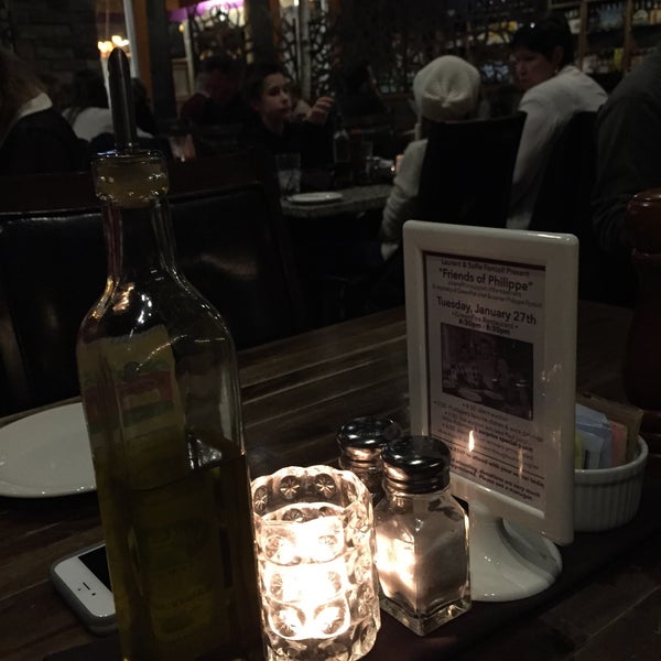 Photo taken at GreenFire Restaurant Bar &amp; Bakery-Woodfire Pizza by Katie M. on 1/3/2015