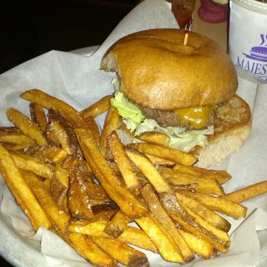 Photo taken at Majestic Burger &amp; Kitchen by Blake on 2/7/2013