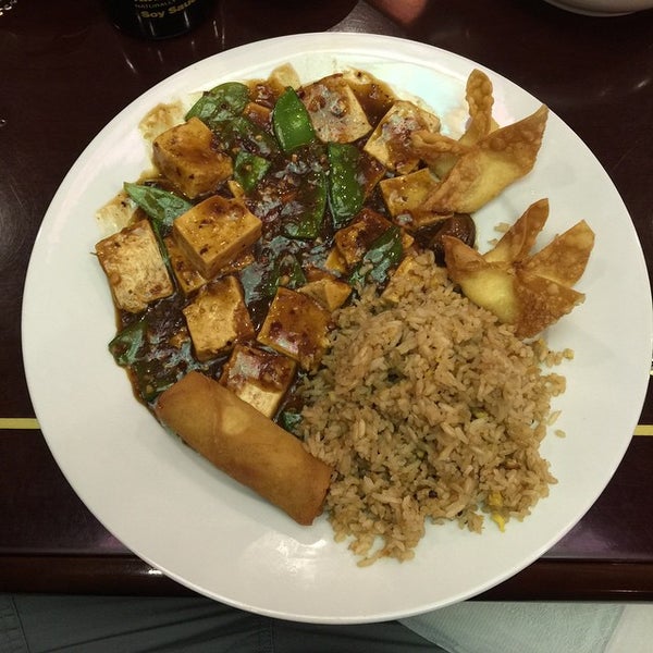 Photo taken at Szechuan Restaurant by Michael B. on 1/8/2015