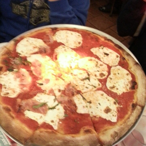 Photo taken at Lombardi&#39;s Coal Oven Pizza by Nicholas H. on 5/25/2013