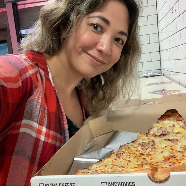 Slice of pizza bigger than your head! No frills.