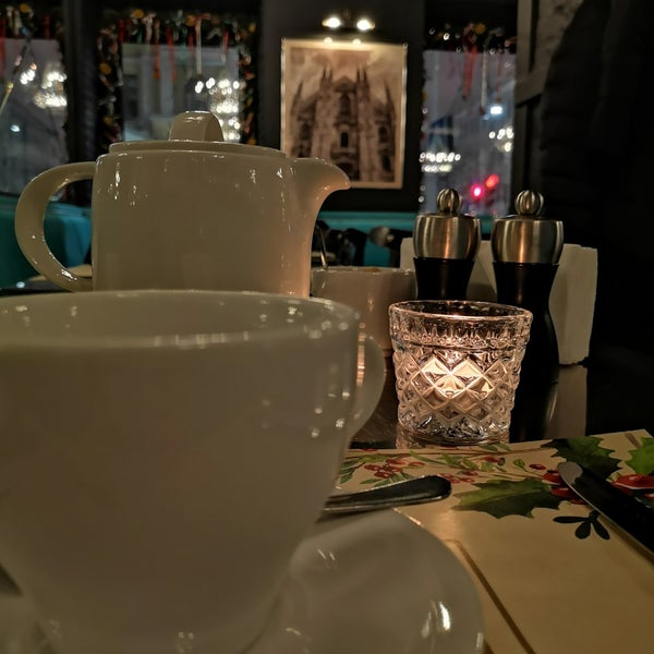 Photo taken at Milano Café by Vera G. on 12/8/2018