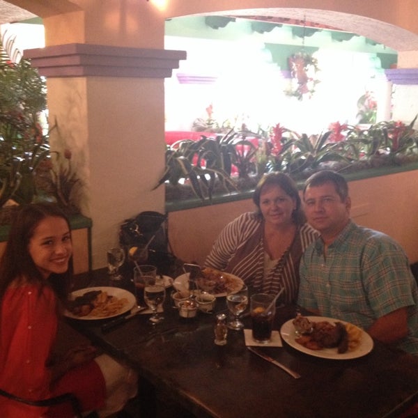 Photo taken at El Novillo Restaurant by Aurora G. on 4/20/2014