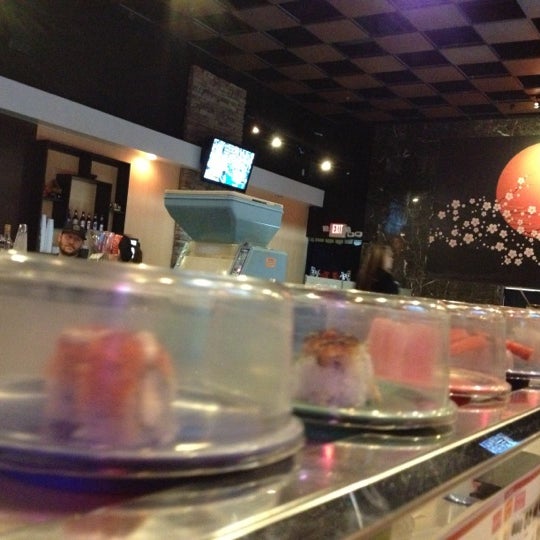 Photo taken at Sushi Envy by Jonathan Harris on 10/28/2012