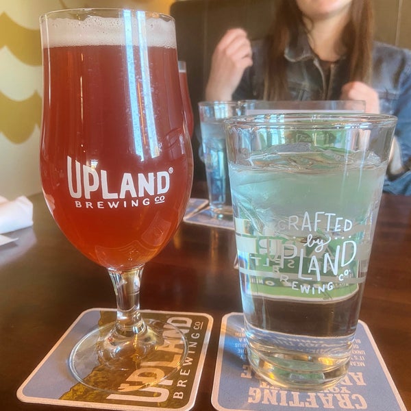 Photo taken at Upland Brewing Company Tasting Room by Caitlin P. on 3/5/2021