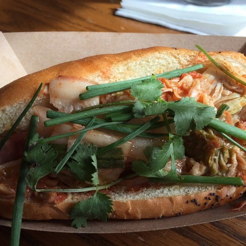 We found the Seoul Dog a work of genius. The kimchi is mellow and funky, on even footing with the shoyu mustard, chives, cilantro, hot dog, and bun, making for a harmonious orchestral blast of flavor.