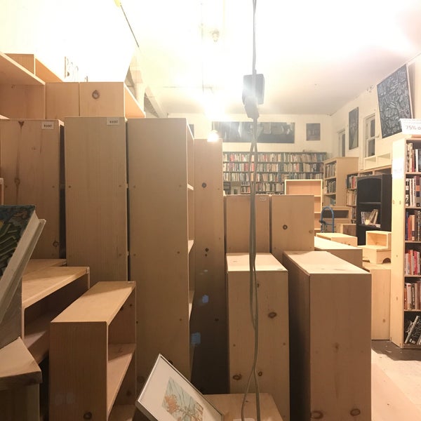 Photo taken at Books &amp; Bookshelves by David L. on 1/17/2018