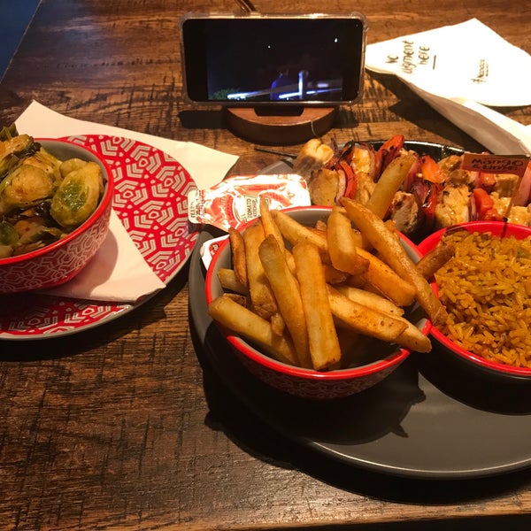 Photo taken at Nando&#39;s by Sembali C. on 6/4/2021