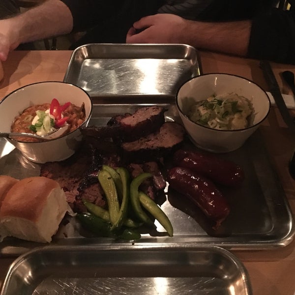 Photo taken at Brisket Southern BBQ &amp; Bar by Kaan Y. on 3/9/2016