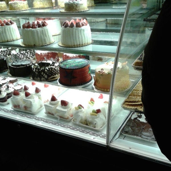 Photo taken at Tiffany&#39;s Bakery by M. W. on 2/28/2014