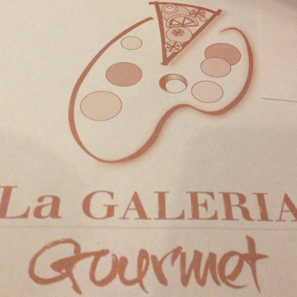 Photo taken at La Galeria Gourmet by Lorena M. on 12/28/2013