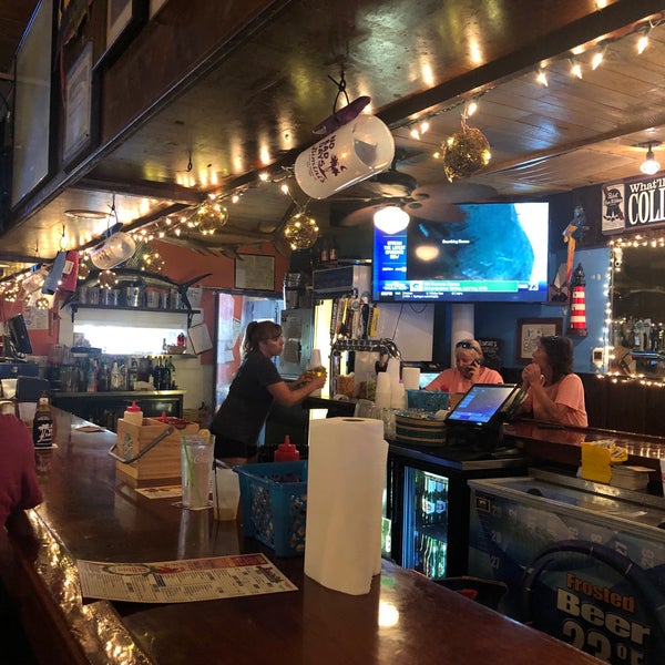 Photo taken at Bimini&#39;s Oyster Bar and Seafood Cafe by Cat M. on 8/13/2019