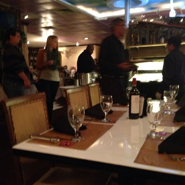 Photo taken at Angus Grill Brazilian Steakhouse by Shakira P. on 11/24/2013