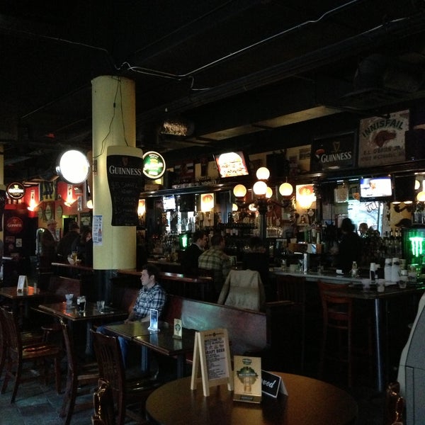 Photo taken at Lizzie McNeill&#39;s Irish Pub by CJ R. on 4/20/2013