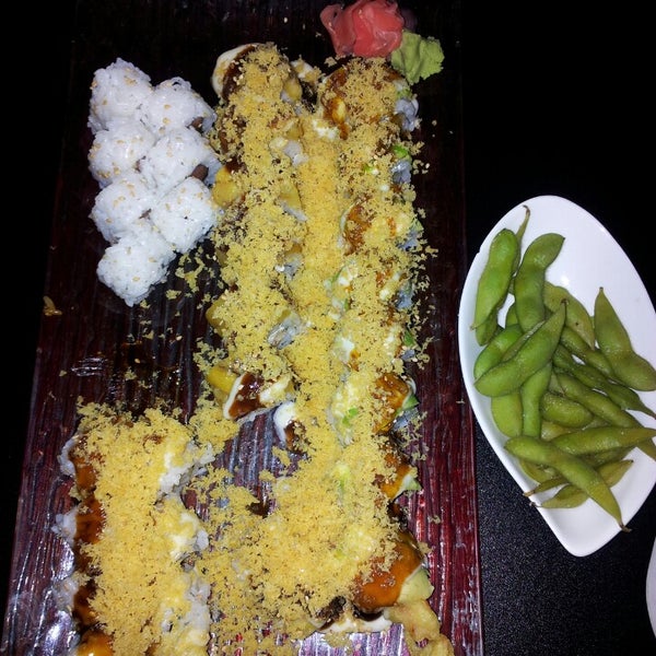 Photo taken at Nigiri Sushi Bar &amp; Restaurant by Grace B. on 9/14/2013