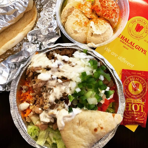 Photo taken at The Halal Guys by val m. on 9/6/2015