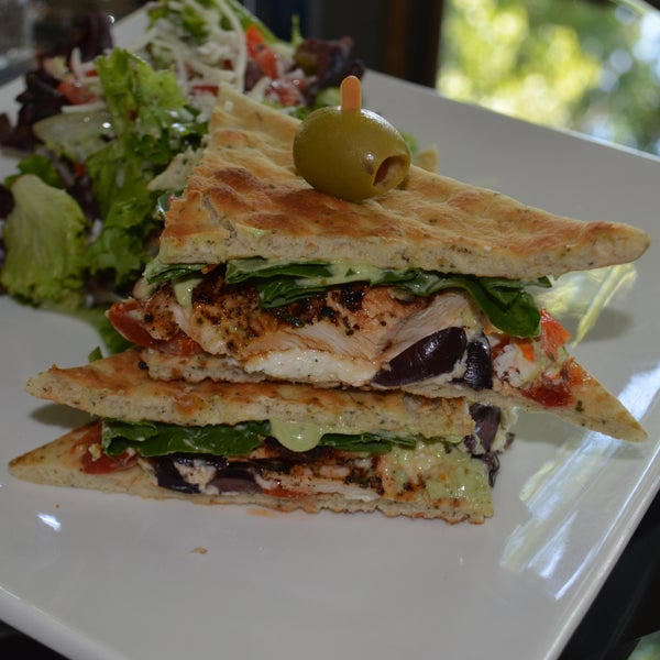Happy Tuesday...go Intentionally Flat with Garlic Grilled Chicken, Spinach, Roasted Tomato, Kalamata olive, Feta & a Roasted Garlic on Flatbread $11...ask for a FREE Glass of House Wine to go with IT!