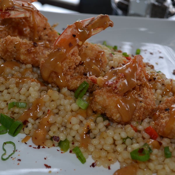Get your TGiF on with Macadamia Crusted Shrimp over Pepper Couscous with a Thai Chile Peanut Sauce $17..btw..Sarah is GueST BaRTenDeR this weekend..come say..HEY!
