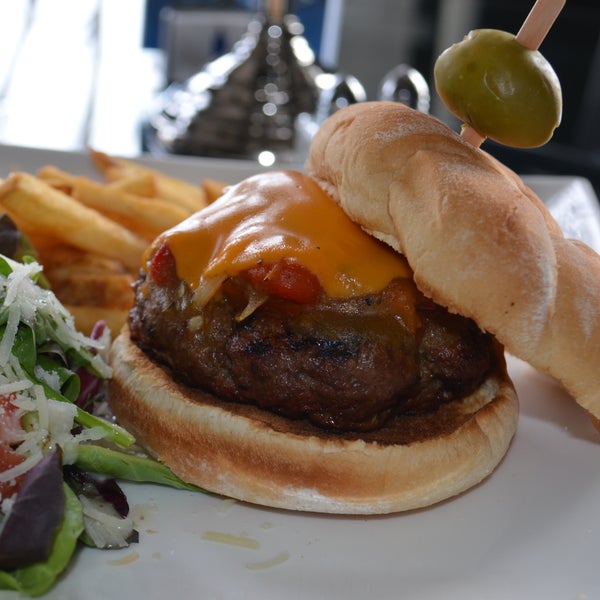 Happy Thirsty Thursday with a FREE Drink of the Day with or without a Shot of Absolut...the Lunch Special is a Grilled Burger with a Poblano Sauce & Cheddar Cheese for $10...see you at 11:30!