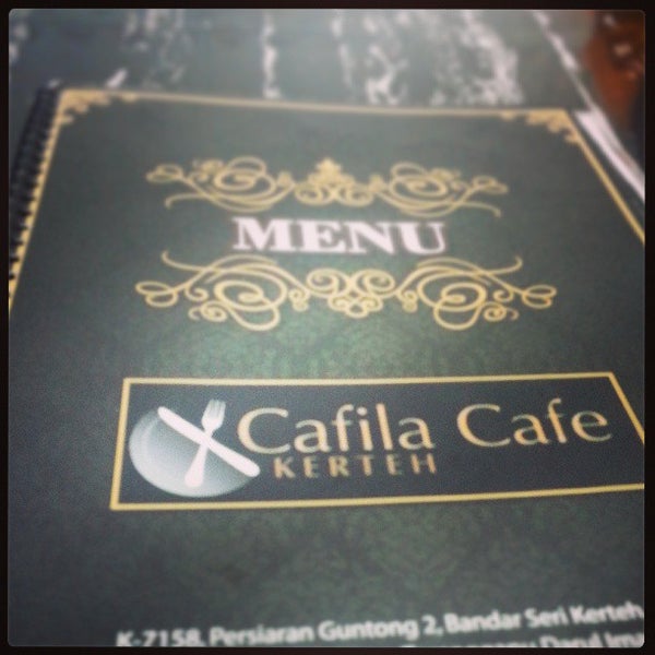 Photo taken at Cafila Cafe by Mohd Azri A. on 4/8/2013