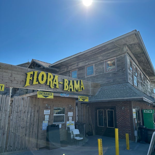 Photo taken at Flora-Bama Lounge, Package, and Oyster Bar by Erin C. on 10/10/2022