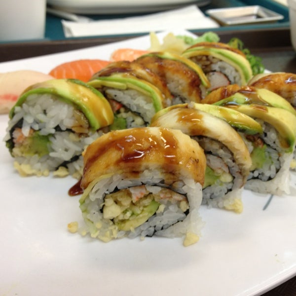 Photo taken at Tensuke Market &amp; Sushi Cafe by Audrey T. on 7/21/2013
