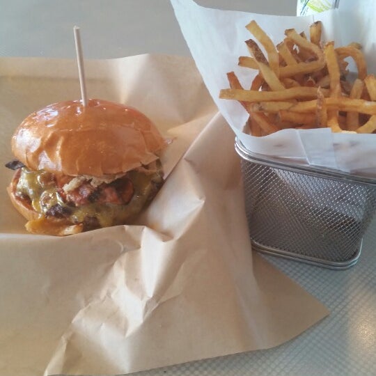Photo taken at Juicy Burgers &amp; Dogs by Bryant S. on 2/9/2015