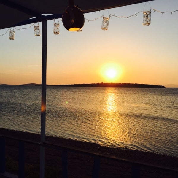 Photo taken at Delicia Restaurant &amp; Beach by İrem B. on 6/13/2015