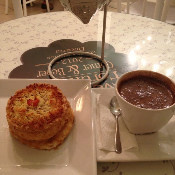 Photo taken at Sucré Patisserie by Valéria P. on 1/4/2013
