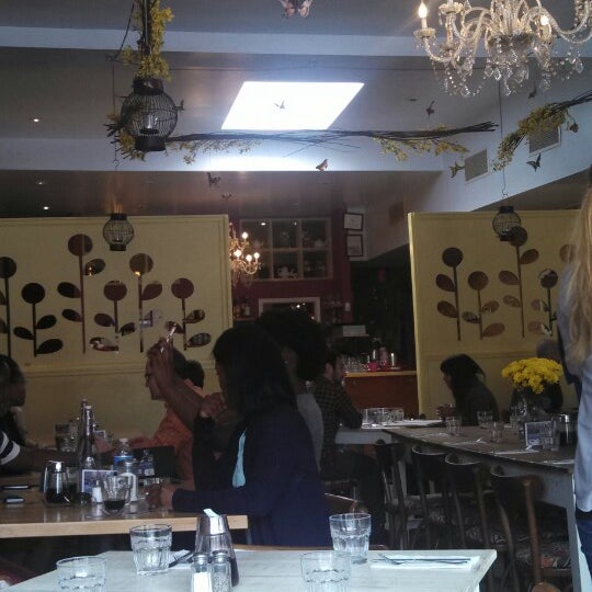 Photo taken at Domku Bar &amp; Cafe by Jess T. on 4/19/2014