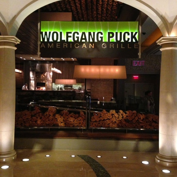 Photo taken at Wolfgang Puck American Grille by J Geoff M. on 2/2/2013