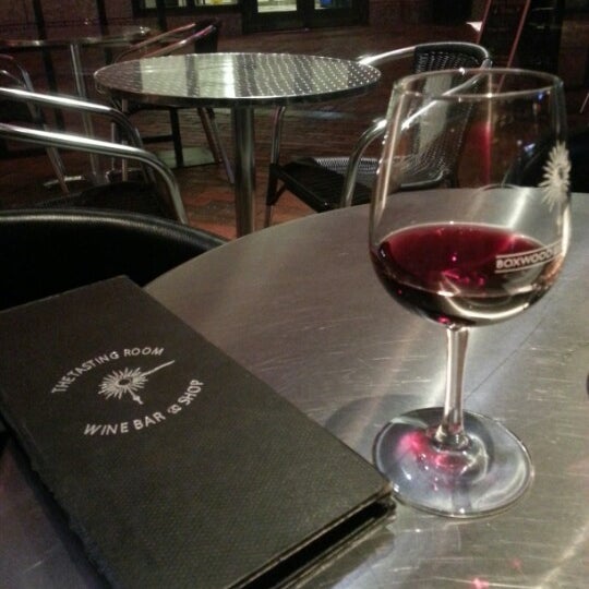 Photo taken at The Tasting Room Wine Bar &amp; Shop by patrick p. on 1/28/2013