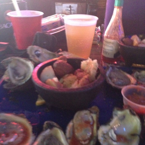 Photo taken at Shuckums Oyster Pub &amp; Grill by Rhonda B. on 9/4/2013