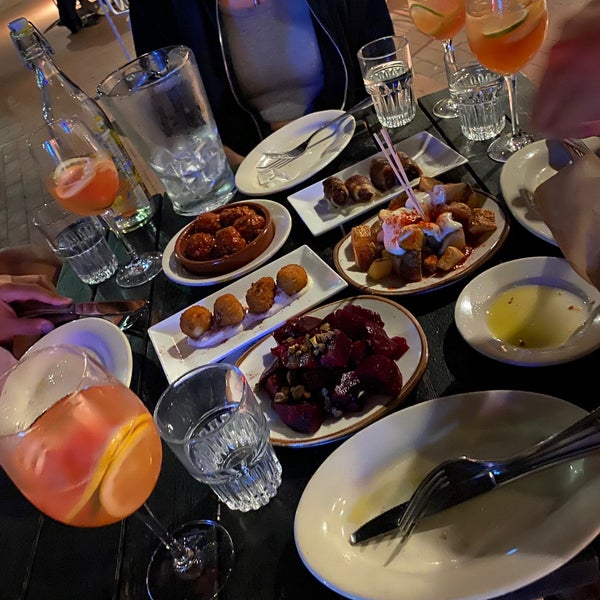 Delicious tapas including Croquettes, patattas bravas, bacon wrapped dates, anchovies, beet salad, and mushrooms. Complimentary bread is delicious. For drinks, get white sangria and guns&roses.