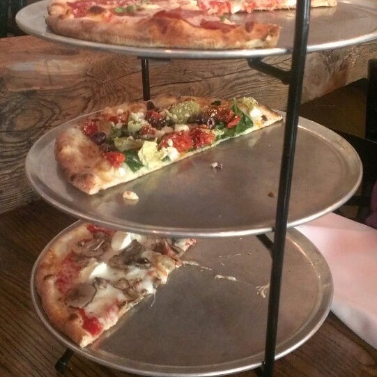Photo taken at The Stonehouse Pizza &amp; Pasteria by Michael O. on 7/31/2014