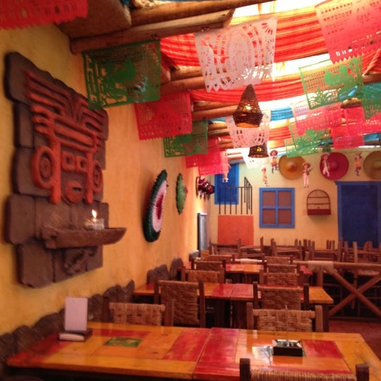 Photo taken at Totopos Gastronomia Mexicana by Elisa C. on 10/19/2012