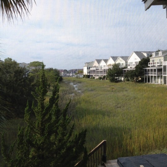 Photo taken at Water&#39;s Edge Inn at Folly Beach by Michelle B. on 9/28/2012